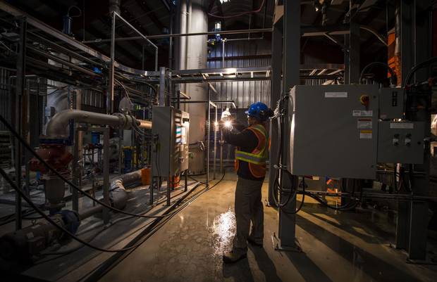 Project manager Scott Brundrett inside the demonstration plant in Squamish, B.C., that is developing a system to pull carbon out of the atmosphere.