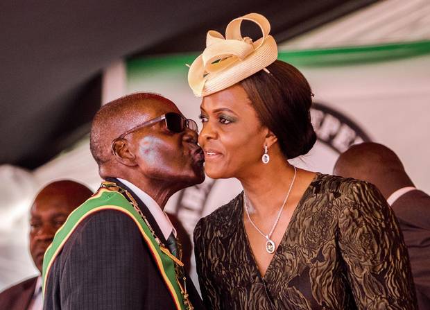 Zimbabwe President Robert Mugabe kisses his wife and first lady Grace during during the country's 37th Independence Day celebrations at the capital, Harare, in April. Her unpopularity may drive voters to opposition camps, a senior member of a rival party says, as she is ‘the most hated woman in Zimbabwe.’