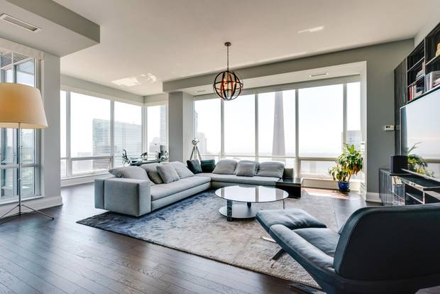 The central living space of Penthouse 4 at 80 John St.