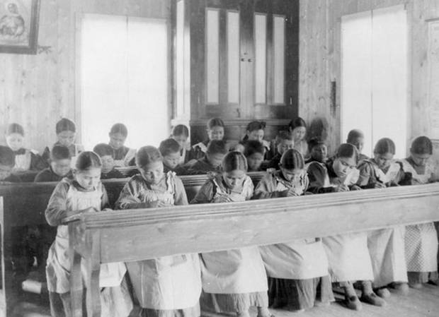 In this handout photo, students are seen in a Northwest Territories classroom within the Fort Resolution Indian Residential School system, a program which has spurred over a decade of reparation cases.